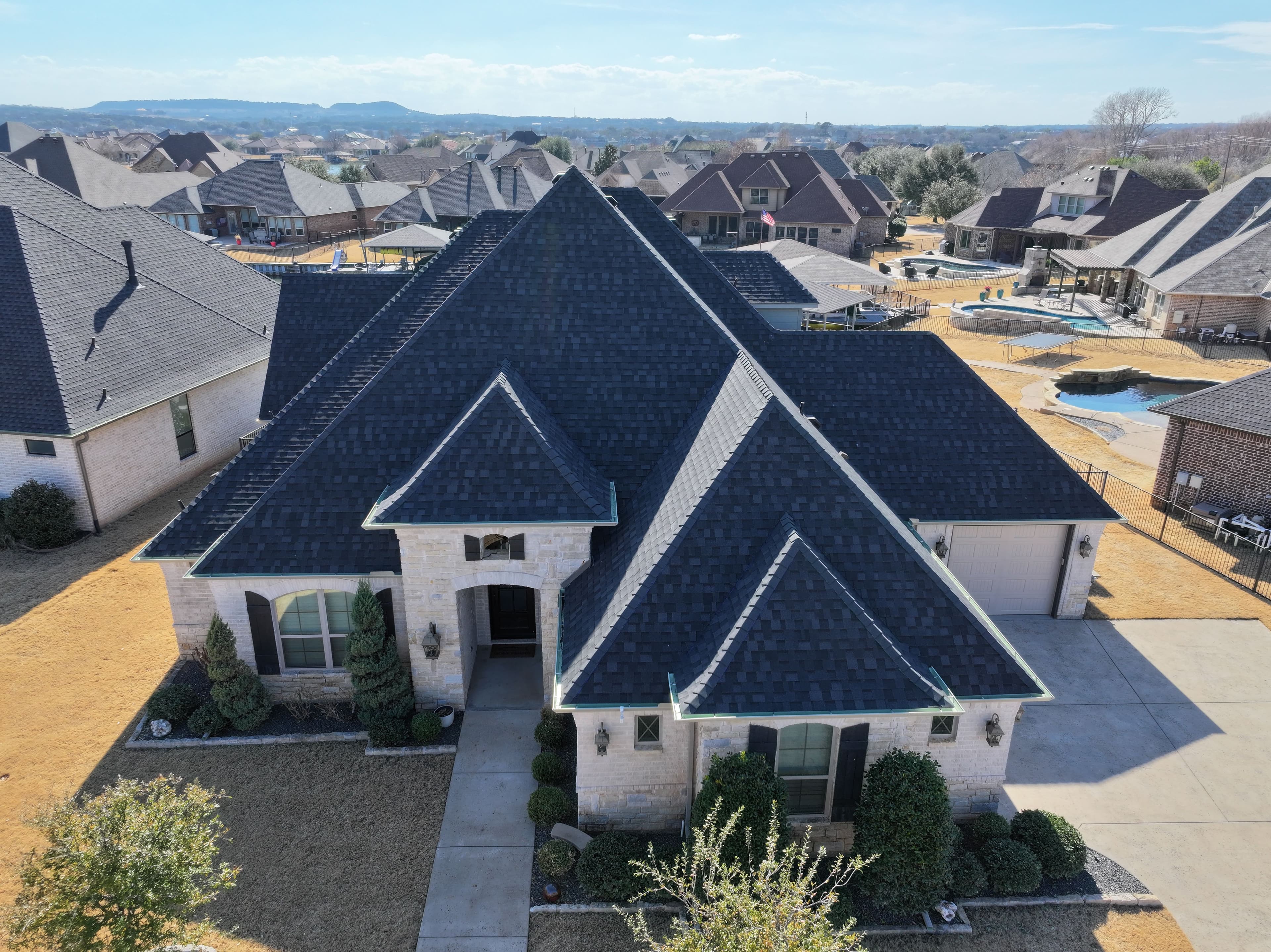 Project Roof Upgrade with IKO Class 4 Shingles in Nordic Granite Black image